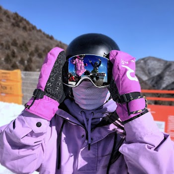 Person in Purple Jacket