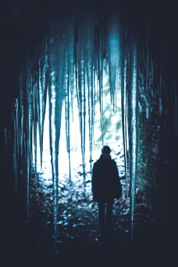 person in spiky ice cave