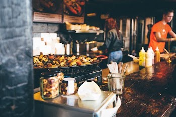 person in the kitchen cooking