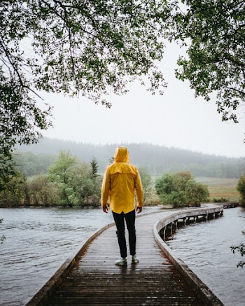 Person In Yellow Raincoat
