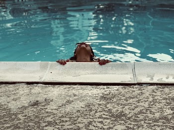 Person Inside Swimming Pool Looking Up