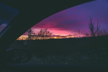 Person Inside Vehicle during Golden Hour