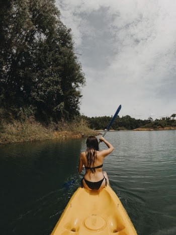 Person kayaking, adventure travel concept. | Free Photo - rawpixel