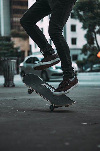 Person Kickflipping 