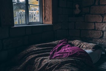 person laying on bed