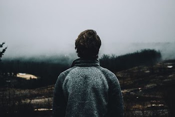 person looking at fog