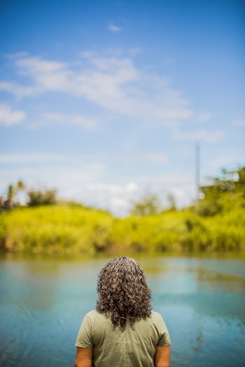 Person Looking At River
