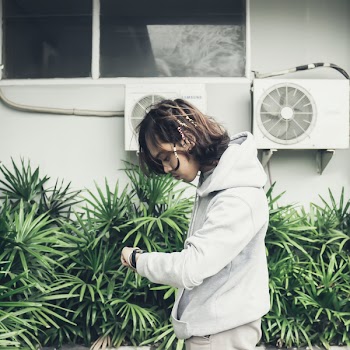 Person Looking at Wristwatch
