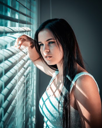 Person Looking Out The Window