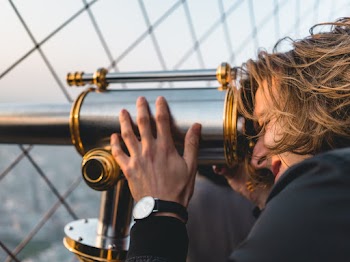 Person Looking Through Binnocular