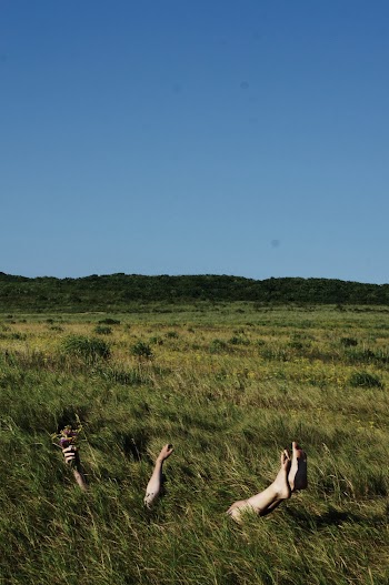 Person Lying on Grass