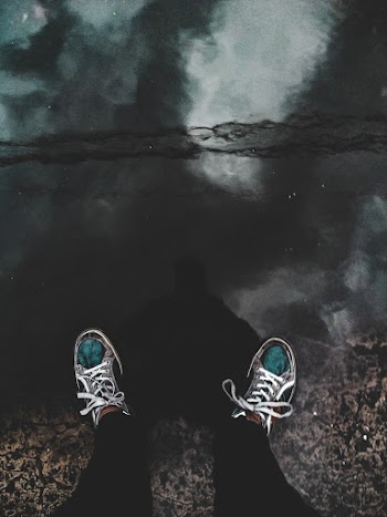 Person Near Puddle