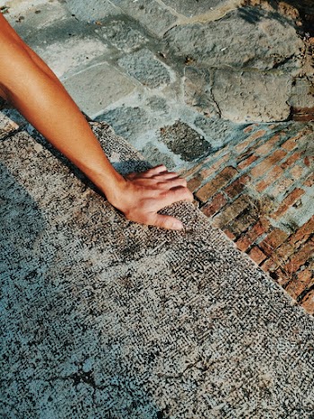 Person on Gray Concrete Pavement