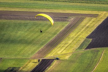 Person on Parachute during Daytime