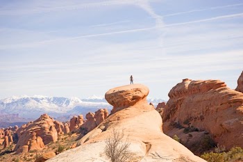 person on top of canyon