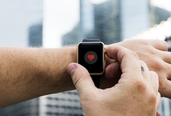 Person Operating Smartwatch