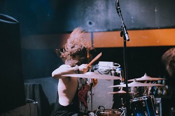 person playing drums