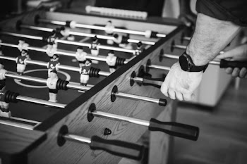 Person Playing Foosball