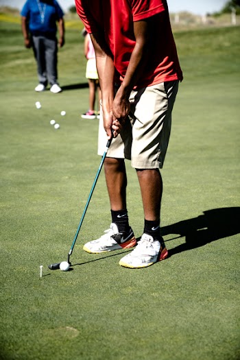 Person Playing Golf