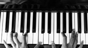 Person Playing Piano