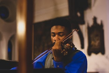 Person Playing Violin