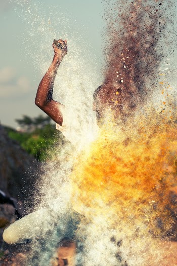 Person Playing With Colored Powder