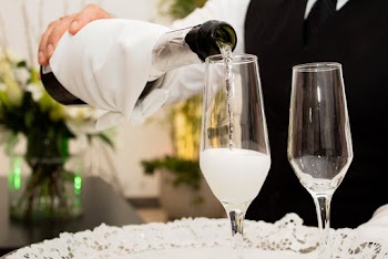 Person Pouring A Drink