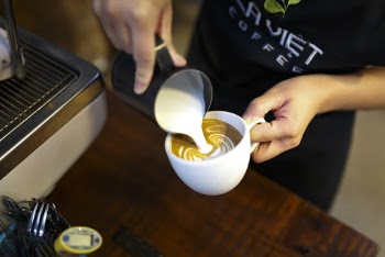 Person Preparing Espresso
