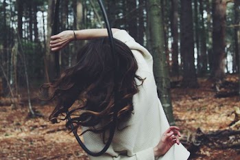 person raising her hand