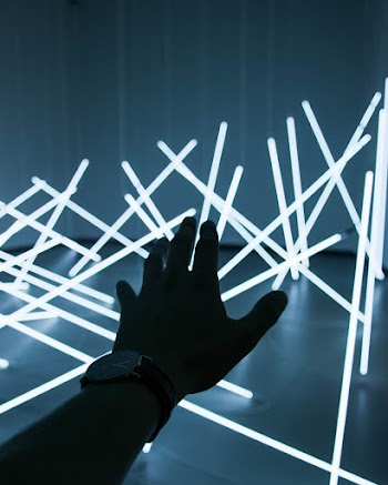 Person Reaching For Glow in The Dark Sticks