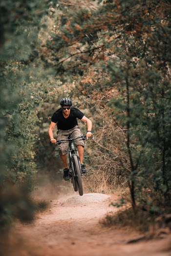 Person Riding A Bicycle