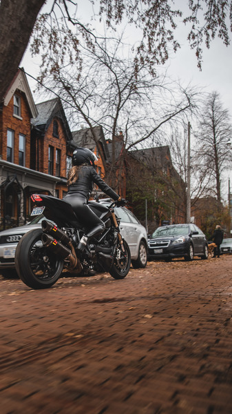 Person Riding Motorcycle 