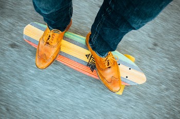 Person Riding on Cruiser Board