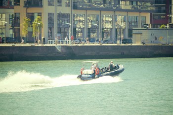 Person Riding on Motorboat
