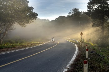 Person Riding on Motorcycle