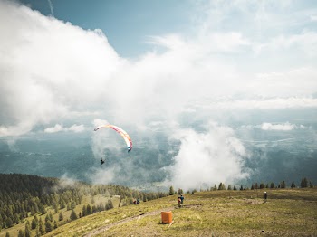 Person Riding on Parachute