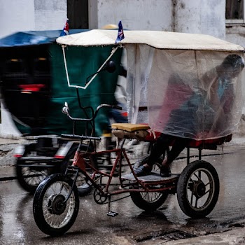 Person Riding Trike Near Road