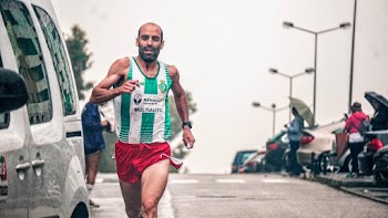 Person Running Beside Vehicle
