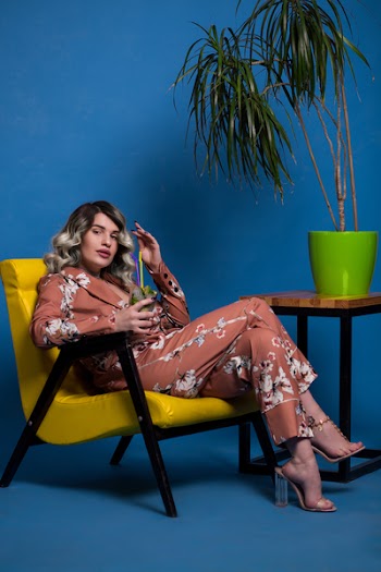 Person Seating on Yellow Chair