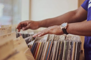 Person Selecting  Different Albums