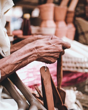 Person Selling Handicrafts