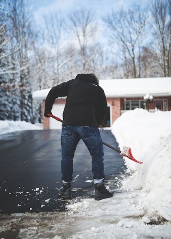 person shoveling snow