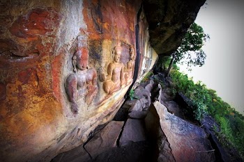 Person Showing Buddha Wall