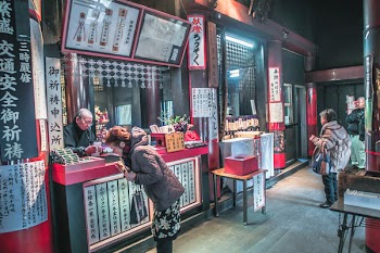 Person Showing Japanese Food Stalls