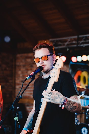 Person Singing on Stage