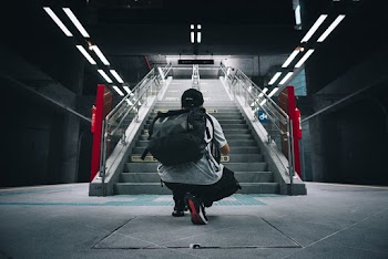 Person Sitting in Floor Indoors