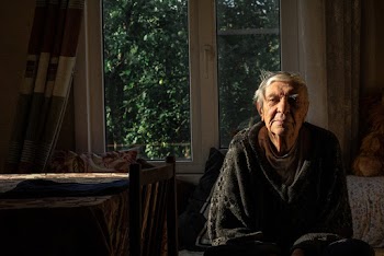 Person Sitting Indoors