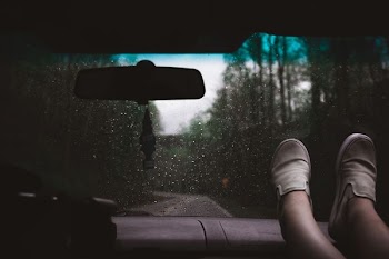 person sitting inside the vehicle