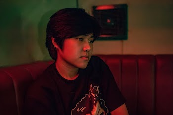 Person Sitting on Couch