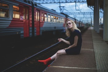 Person Sitting On Platform